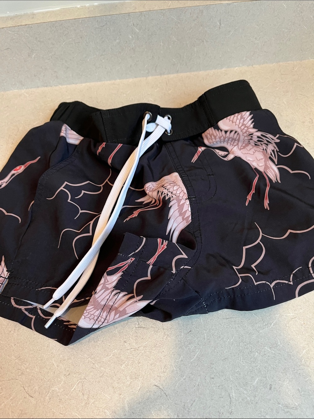 Black Board Shorts with Pink Crane Print
